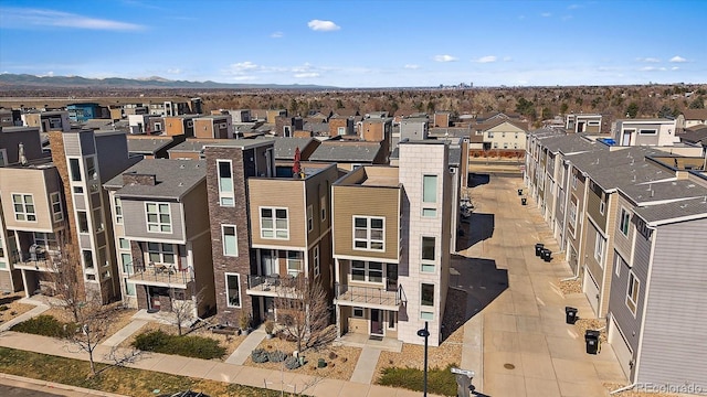 aerial view with a mountain view and a residential view