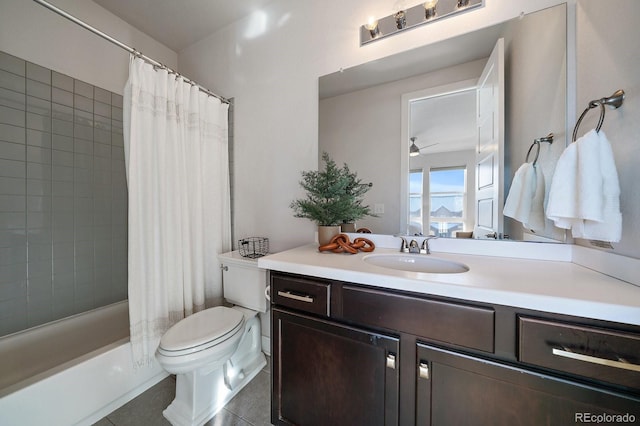 bathroom featuring vanity, ceiling fan, tile patterned flooring, toilet, and shower / tub combo with curtain