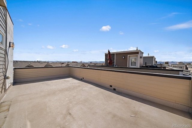 view of patio with a balcony