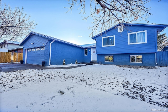 tri-level home with a garage