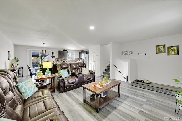 living room with light hardwood / wood-style floors