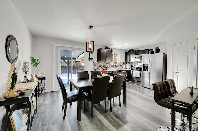 dining room with light hardwood / wood-style floors