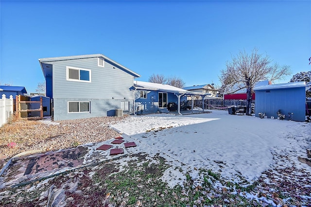 view of snow covered property