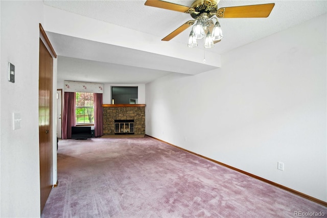 210 W Jamison Cir Unit 41, Littleton, CO 80120 - unfurnished living room with carpet flooring, a ceiling fan, and a glass covered fireplace