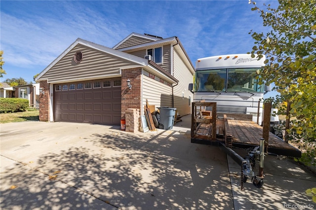 view of front of property featuring a garage