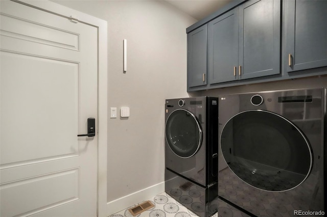 3630 Mesa Verde Rd, Monument, CO 80132 - laundry room featuring cabinet space and washing machine and clothes dryer