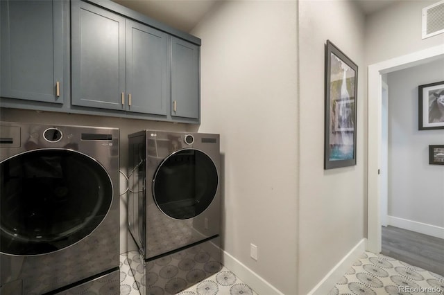 3630 Mesa Verde Rd, Monument, CO 80132 - laundry room with cabinet space and washing machine and clothes dryer