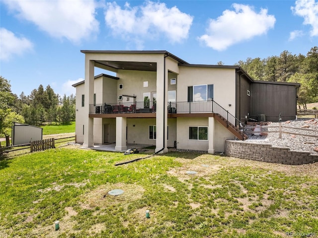3630 Mesa Verde Rd, Monument, CO 80132 - rear view of property with stucco siding, stairs, a deck, and a patio