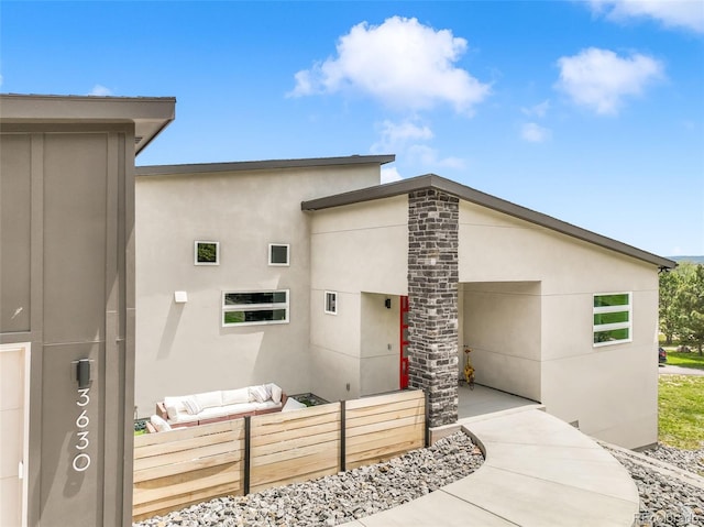 3630 Mesa Verde Rd, Monument, CO 80132 - view of front of house featuring an outdoor living space and stucco siding