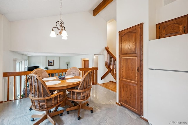 5513 S Yank Ct, Littleton, CO 80127 - dining area featuring a chandelier, beamed ceiling, high vaulted ceiling, and stairway