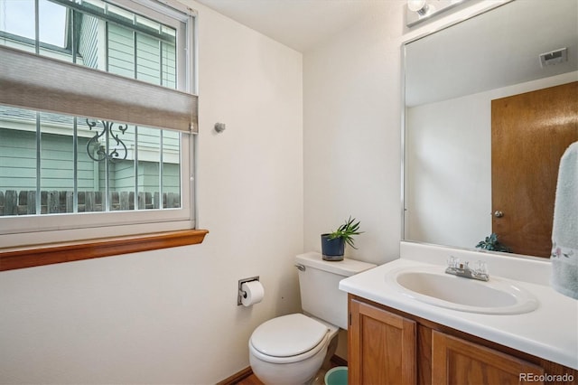 5513 S Yank Ct, Littleton, CO 80127 - half bath with healthy amount of natural light and vanity