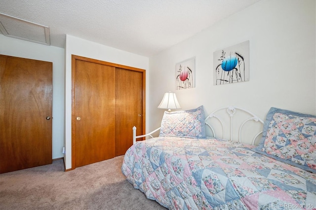 5513 S Yank Ct, Littleton, CO 80127 - carpeted bedroom with a closet and attic access