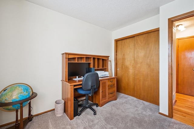 5513 S Yank Ct, Littleton, CO 80127 - carpeted home office featuring a textured ceiling
