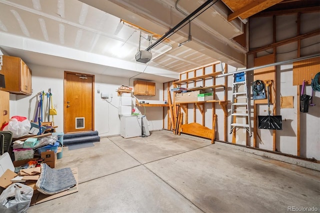 5513 S Yank Ct, Littleton, CO 80127 - garage featuring a garage door opener