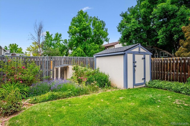 5513 S Yank Ct, Littleton, CO 80127 - fenced backyard with a storage shed