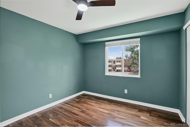 10211 Ura Ln Unit 208, Thornton, CO 80260 - spare room with dark wood-type flooring and a ceiling fan