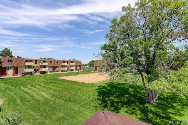 10211 Ura Ln Unit 208, Thornton, CO 80260 - view of home's community featuring a yard and volleyball court