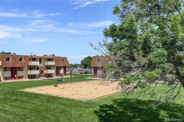 10211 Ura Ln Unit 208, Thornton, CO 80260 - view of property's community with a yard and volleyball court