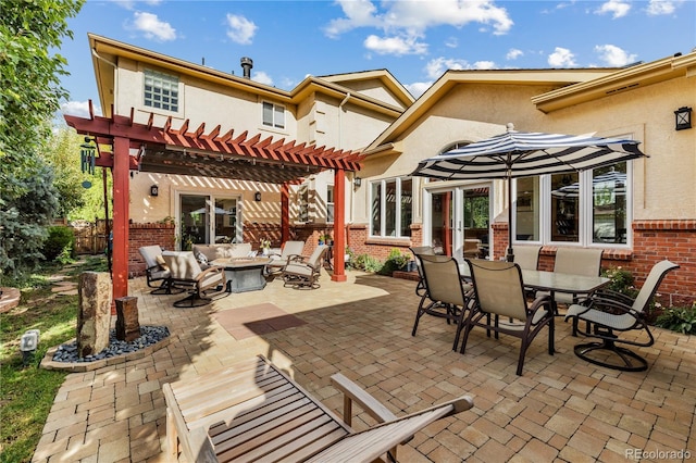 view of patio featuring a pergola and an outdoor hangout area