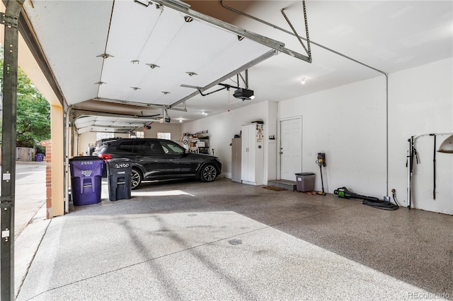 garage featuring a garage door opener