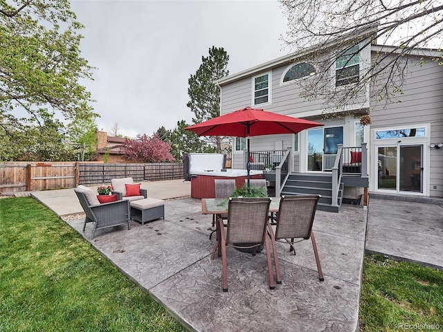view of patio / terrace featuring fence and outdoor dining space