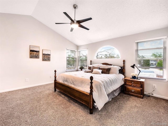 bedroom with baseboards, a ceiling fan, carpet flooring, and lofted ceiling
