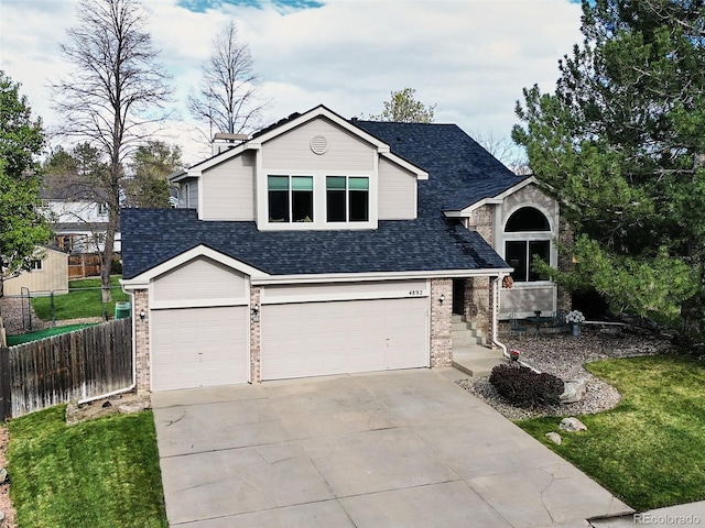 view of front of property with fence, an attached garage, a shingled roof, and brick siding