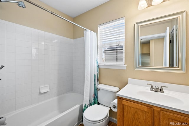 full bathroom with vanity, toilet, and shower / bath combo