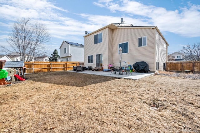 back of house featuring a patio area