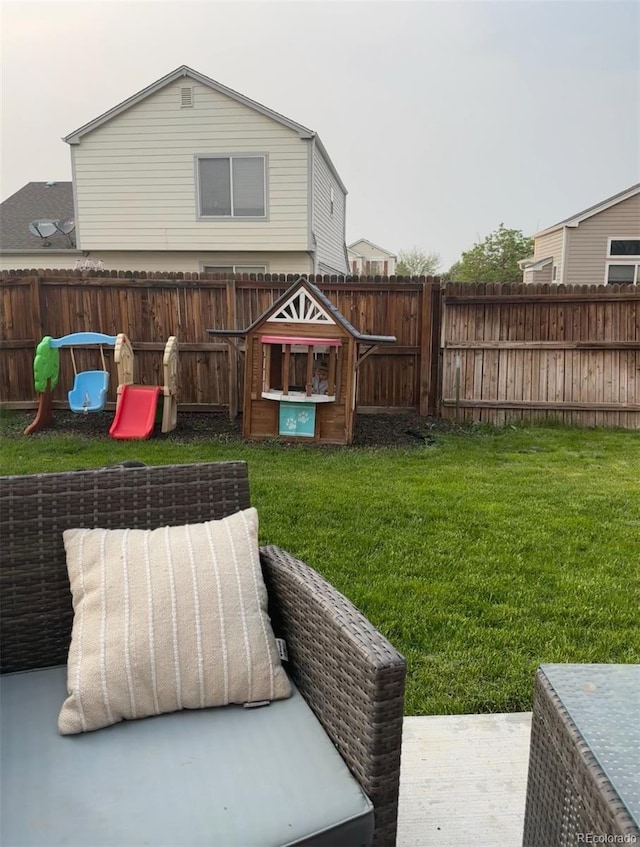 view of yard with a playground