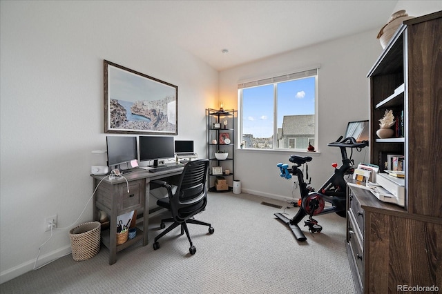 office space with carpet floors and baseboards