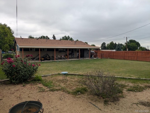 290 W 1st Ave, Broomfield, CO 80020 - rear view of property with a patio area