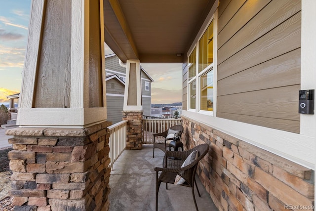 view of patio terrace at dusk