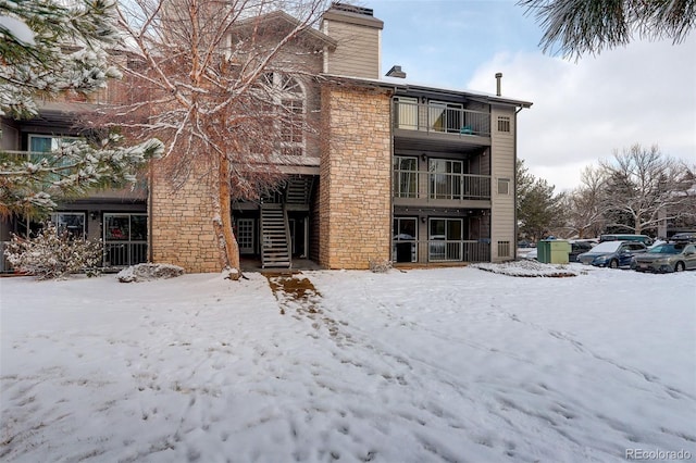 view of snow covered property