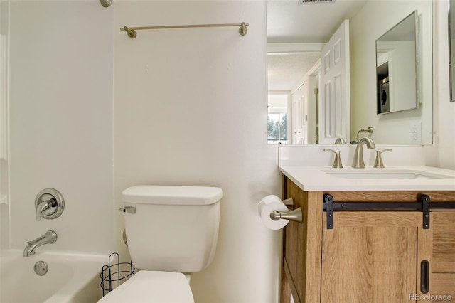 full bathroom featuring bathtub / shower combination, vanity, and toilet