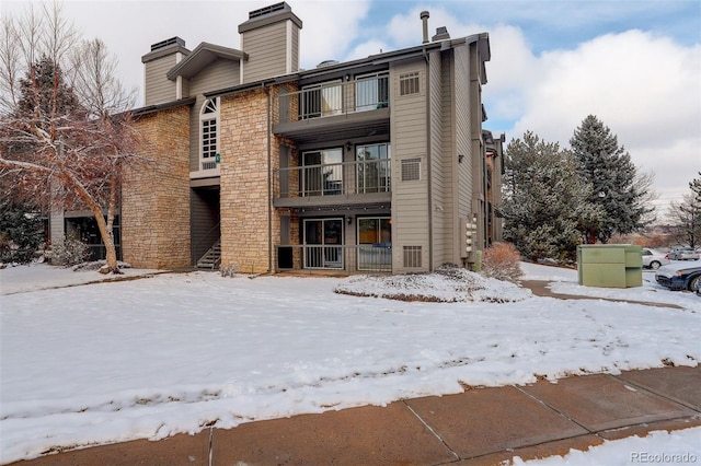 view of snow covered building