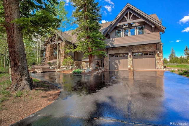 craftsman-style house featuring a garage