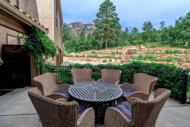 view of patio with a mountain view