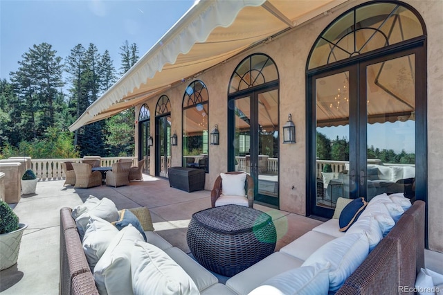 view of patio with outdoor lounge area and french doors