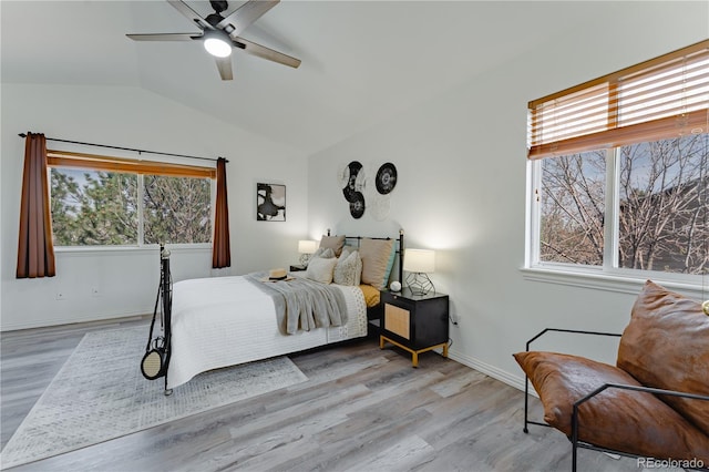 2875 S Tower Way, Aurora, CO 80013 - bedroom featuring lofted ceiling, wood finished floors, and a ceiling fan