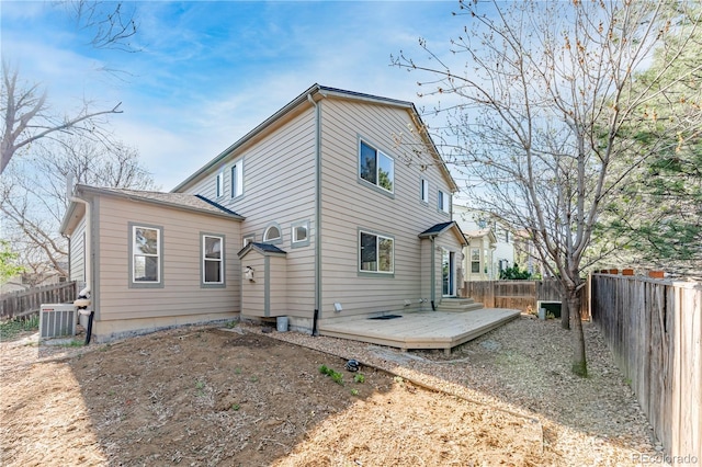 2875 S Tower Way, Aurora, CO 80013 - rear view of property featuring a fenced backyard and a deck