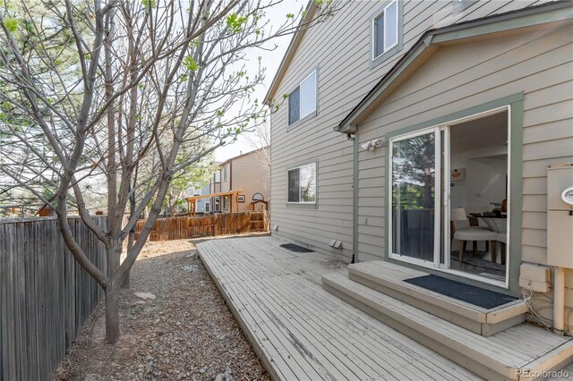 2875 S Tower Way, Aurora, CO 80013 - deck featuring a fenced backyard