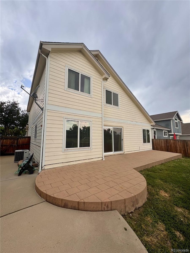10064 Westside Cir, Littleton, CO 80125 - back of property with a patio