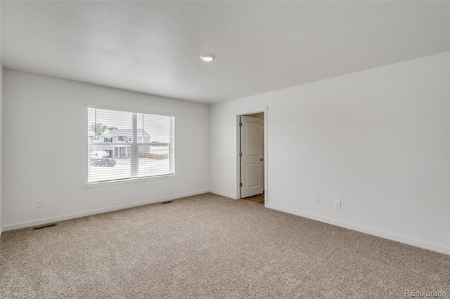 empty room featuring carpet