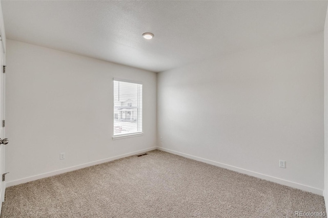 empty room with carpet floors