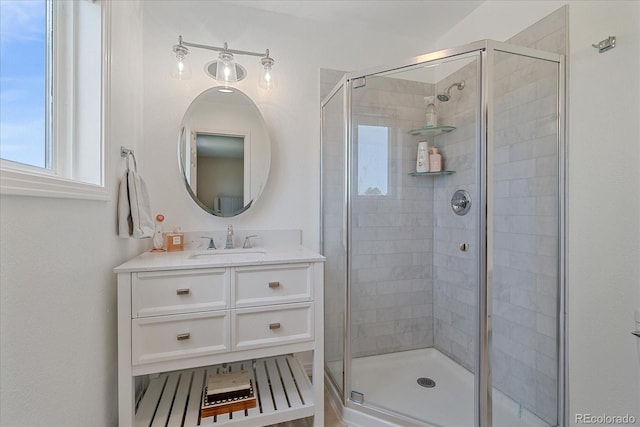 full bath featuring vanity and a stall shower