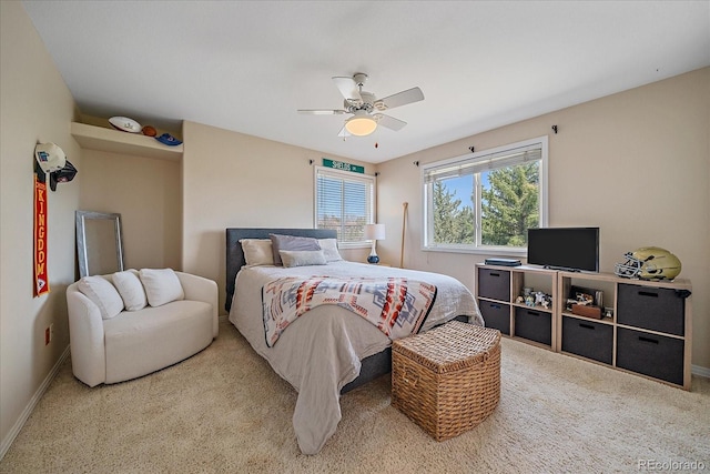 bedroom featuring carpet floors, a ceiling fan, and baseboards
