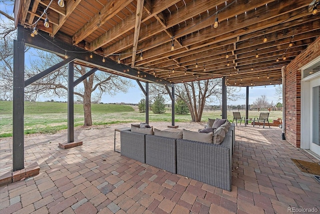 view of patio / terrace featuring a rural view and an outdoor hangout area