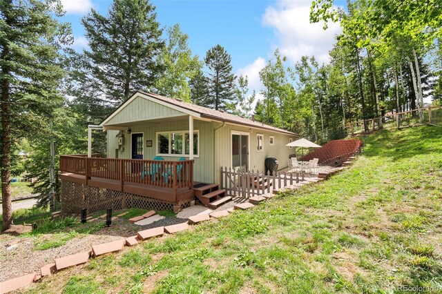 7256 Aspen Meadow Dr, Evergreen, CO 80439 - rear view of property with a patio area and a wooden deck