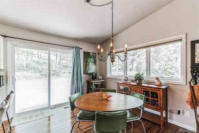 7256 Aspen Meadow Dr, Evergreen, CO 80439 - dining area with a chandelier, wood finished floors, and lofted ceiling
